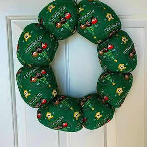 This is a cushion reef with Harry Potter designs color green